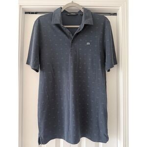 Travis Mathew blue golf performance polo size medium
Q